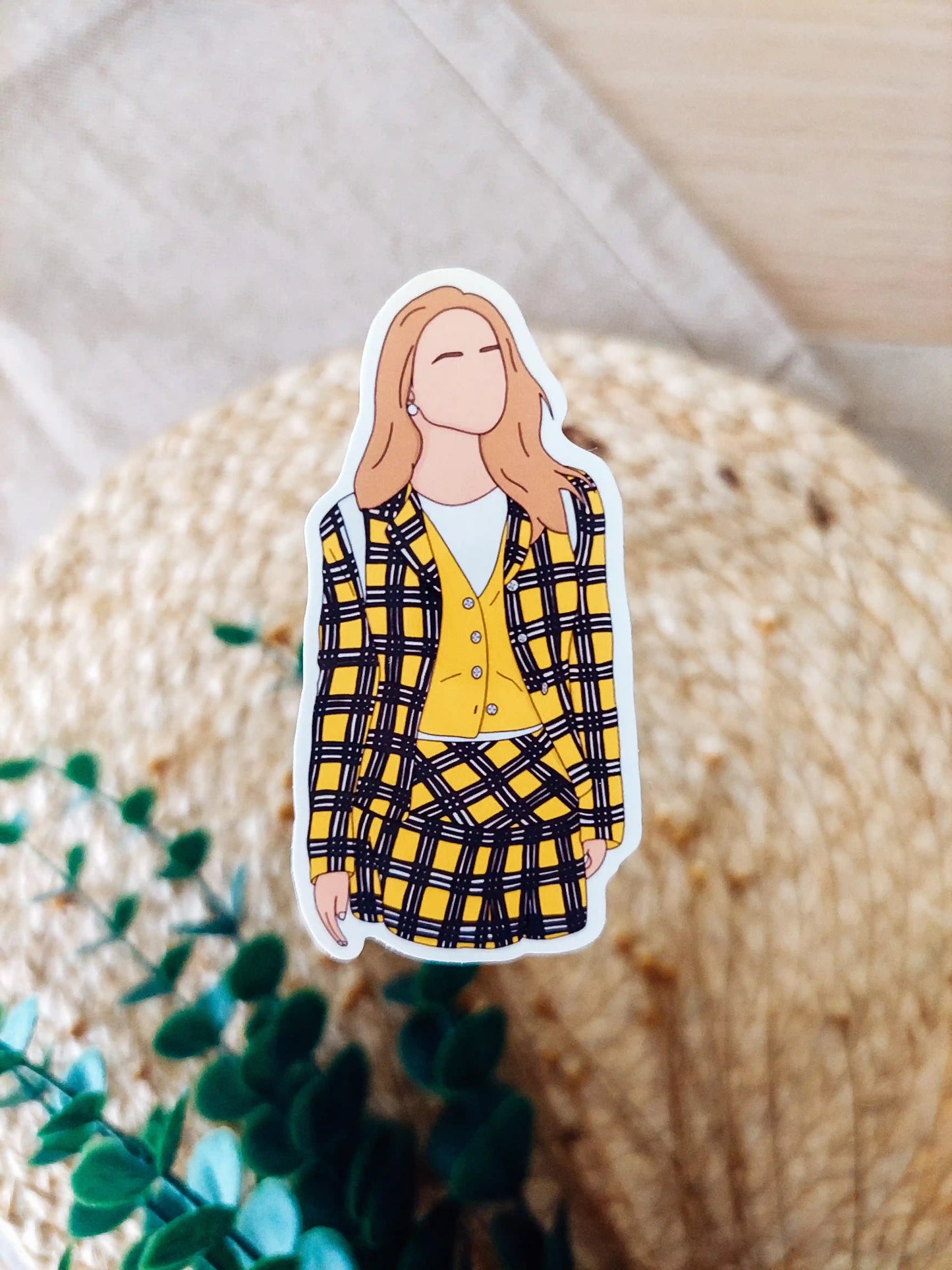 Close up photo of a vinyl sticker inspired by Clueless, featuring Cher Horowitz.