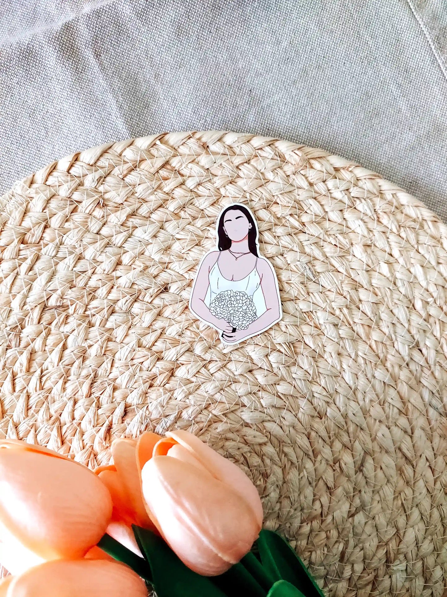 Close up photo of a vinyl sticker inspired by The Summer I Turned Pretty, featuring Belly Conklin.