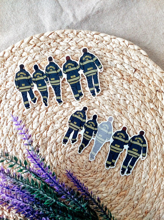 Close up photo of a vinyl sticker inspired by 9-1-1, featuring the 118th.
