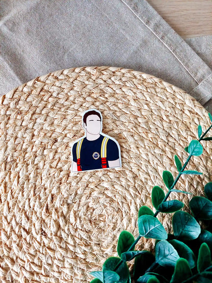 Close up photo of a vinyl sticker inspired by 9-1-1, featuring Eddie Diaz.