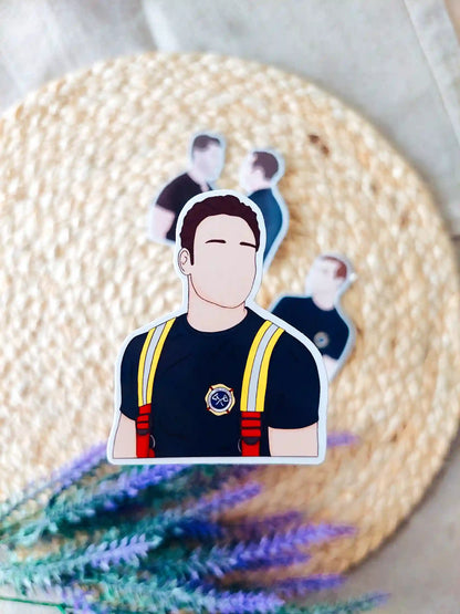 Close up photo of a vinyl sticker inspired by 9-1-1, featuring Eddie Diaz.