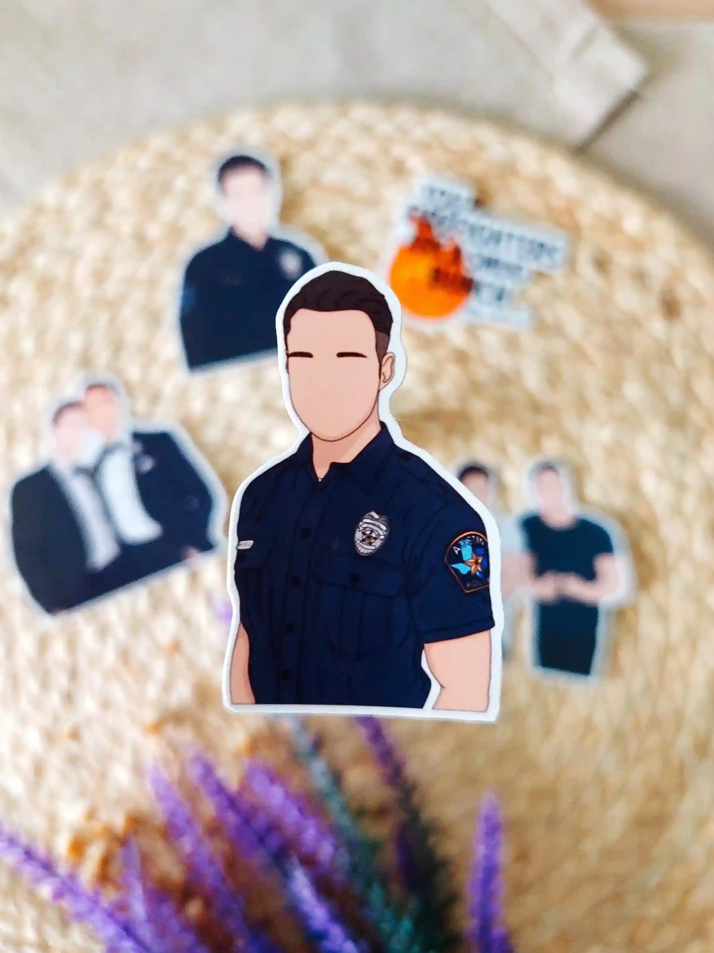 Close up photo of a vinyl sticker inspired by 9-1-1 Lone Star, featuring Carlos Reyes.