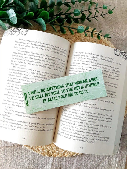 Off Campus inspired bookmark displayed on an open book, featuring an illustration of Allie and Dean on the front and the quote "I will do anything that woman asks. I'd sell my soul to the devil himself if allie told me to" on the back.