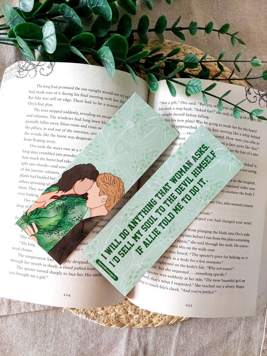 Off Campus inspired bookmark displayed on an open book, featuring an illustration of Allie and Dean on the front and the quote "I will do anything that woman asks. I'd sell my soul to the devil himself if allie told me to" on the back.