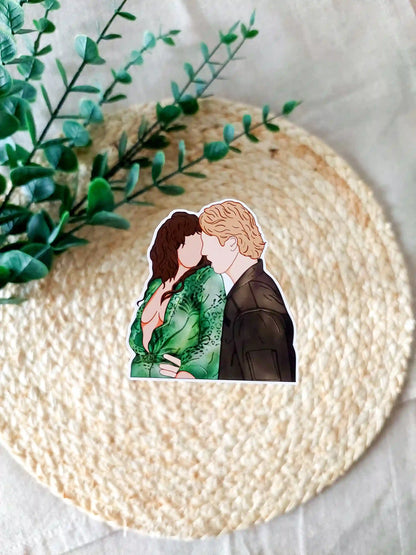 Off Campus inspired sticker photographed on a rattan placemat, featuring an illustration of Allie and Dean dancing.