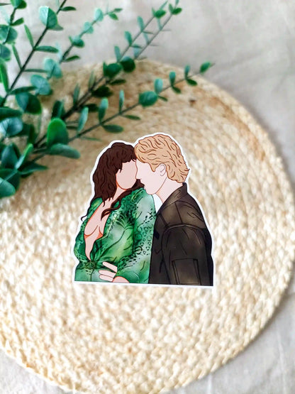 Off Campus inspired sticker photographed on a rattan placemat, featuring an illustration of Allie and Dean dancing.