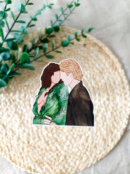 Off Campus inspired sticker photographed on a rattan placemat, featuring an illustration of Allie and Dean dancing.