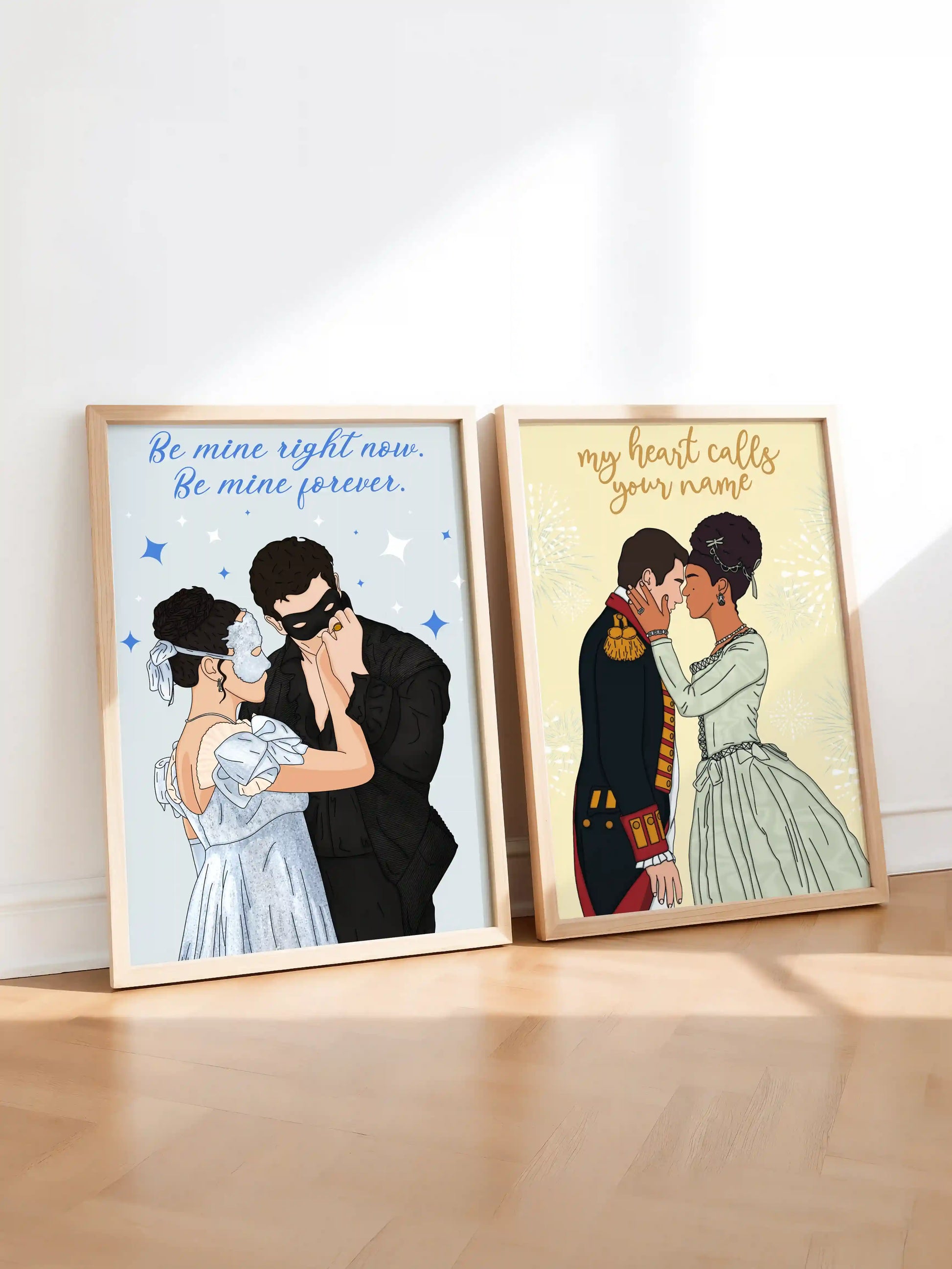 Bundle of two art prints inspired by Bridgerton, featuring illustrations of two couples from the series, displayed side by side in light wooden frames.