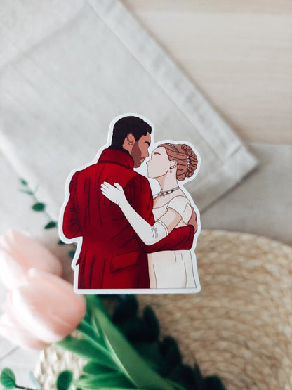 Close up photo of a vinyl sticker inspired by Bridgerton, featuring Daphne and Simon.