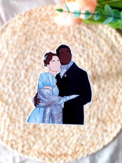 Close up photo of a vinyl sticker inspired by Bridgerton, featuring Francesca and John.