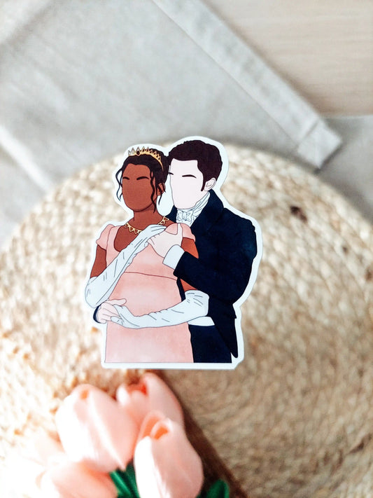 Close up photo of a vinyl sticker inspired by Bridgerton, featuring Kate and Anthony.