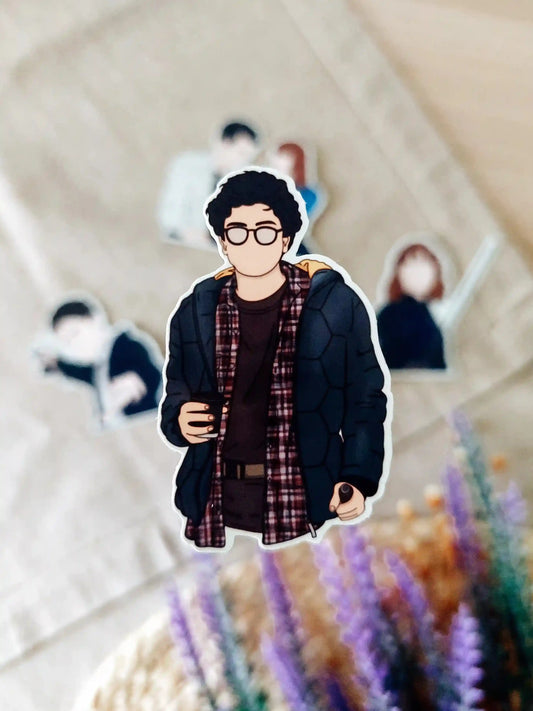 Close up photo of a vinyl sticker inspired by Lockwood & Co, featuring George Karim.