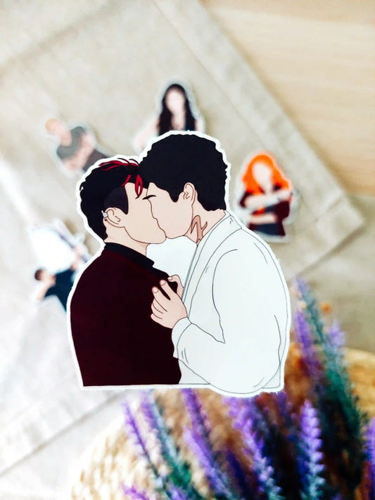 Close up photo of a vinyl sticker inspired by Shadowhunters, featuring Alec Lightwood and Magnus Bane.