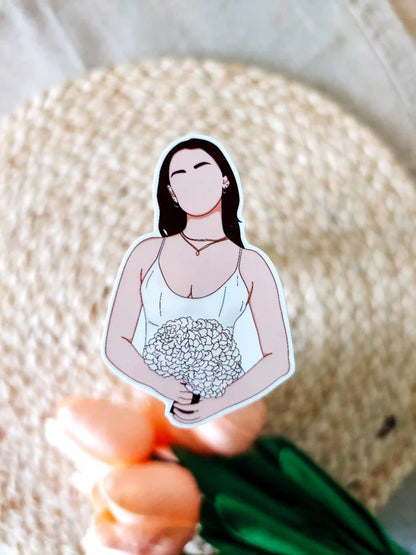 Close up photo of a vinyl sticker inspired by The Summer I Turned Pretty, featuring Belly Conklin.