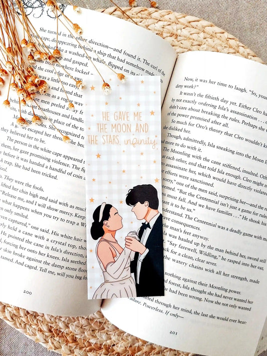 Bookmark inspired by The Summer I Turned Pretty, featuring Belly and Conrad with the quote "He gave me the moon and the stars, infinity." on a gold gingham background with little gold stars, resting on an open book.