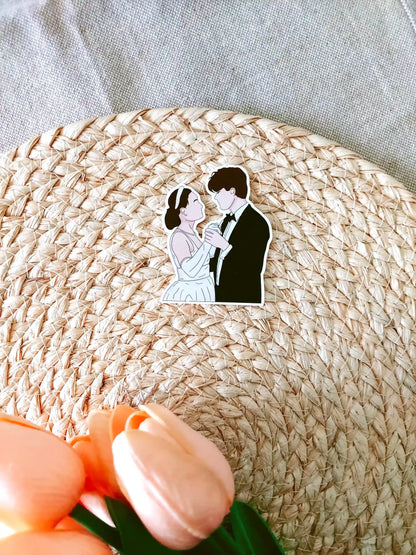 Close up photo of a vinyl sticker inspired by The Summer I Turned Pretty, featuring Belly and Conrad dancing.