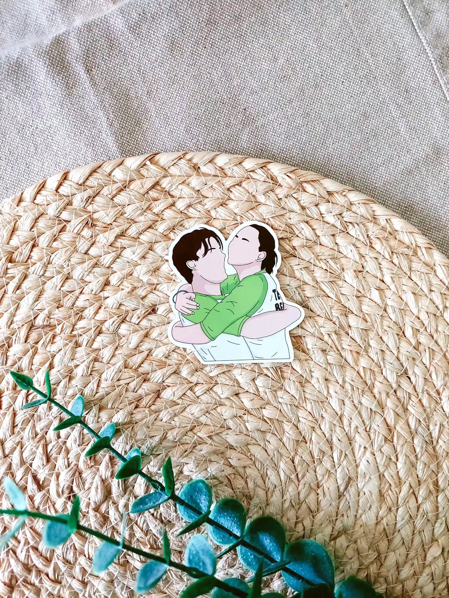 Close up photo of a vinyl sticker inspired by The Summer I Turned Pretty, featuring Belly and Conrad.